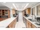 Bright and modern kitchen featuring stainless steel appliances, white countertops and tile floors at 18522 N Mica Dr, Sun City West, AZ 85375