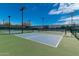 Well-maintained pickleball courts with new nets and lights ready for recreational play in Sun City West at 18522 N Mica Dr, Sun City West, AZ 85375