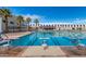 A pristine lap pool with starting blocks provides a state-of-the-art facility for swimming and aquatic activities in a welcoming setting at 18522 N Mica Dr, Sun City West, AZ 85375