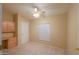 Cozy bedroom featuring built-in desk area and ample natural light at 1855 N Rim Rock Dr, Casa Grande, AZ 85122