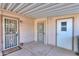 Covered entryway with security doors and a welcoming 'Welcome' mat at 1855 N Rim Rock Dr, Casa Grande, AZ 85122