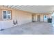 Covered carport providing ample parking with direct access to the home's entrance at 1855 N Rim Rock Dr, Casa Grande, AZ 85122