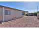 Side of a home featuring desert landscaping, a privacy fence and low maintenance yard at 1855 N Rim Rock Dr, Casa Grande, AZ 85122