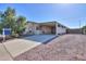 Charming single-story home with covered parking and low-maintenance desert landscaping at 1855 N Rim Rock Dr, Casa Grande, AZ 85122