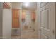 Functional laundry room with ample storage and built-in cabinets, perfect for organization at 1855 N Rim Rock Dr, Casa Grande, AZ 85122