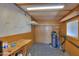 Inside the shed with a workbench, shelving, and pegboard walls for tool storage and organization at 1855 N Rim Rock Dr, Casa Grande, AZ 85122