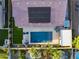 Stunning aerial view of a private backyard oasis, featuring a sparkling pool and solar panels at 21283 E Camacho Rd, Queen Creek, AZ 85142
