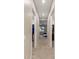 Hallway with carpeted floors and access to closets on each side at 21283 E Camacho Rd, Queen Creek, AZ 85142