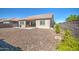 Spacious backyard featuring gravel, a covered patio, and privacy wall at 21551 E Waverly Ct, Queen Creek, AZ 85142