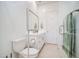 Modern bathroom featuring new fixtures, a mirror, a vanity, and a toilet in a bright space at 21551 E Waverly Ct, Queen Creek, AZ 85142