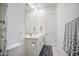 Bright bathroom featuring double sinks, a mirror, and white cabinets at 21551 E Waverly Ct, Queen Creek, AZ 85142