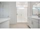 Bright bathroom featuring a glass-enclosed shower and modern fixtures at 21551 E Waverly Ct, Queen Creek, AZ 85142