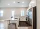 Modern kitchen showcasing stainless steel appliances, granite countertops, and plenty of counter space at 21551 E Waverly Ct, Queen Creek, AZ 85142