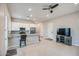 Beautiful kitchen featuring stainless steel appliances, a breakfast bar, and ample cabinet space at 21551 E Waverly Ct, Queen Creek, AZ 85142