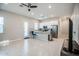 Bright, open kitchen featuring stainless steel appliances, granite countertops, and a breakfast bar at 21551 E Waverly Ct, Queen Creek, AZ 85142