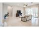 Spacious living room with tile floors, perfect for entertaining guests and Gathering at 21551 E Waverly Ct, Queen Creek, AZ 85142