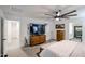 Bright, spacious bedroom offering plenty of natural light, a ceiling fan, and access to an ensuite bath at 2158 N 212Th Ave, Buckeye, AZ 85396