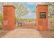Inviting community trail entrance with shade and seating with desert views at 2158 N 212Th Ave, Buckeye, AZ 85396
