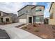 Charming two-story home showcasing a neutral color palette, xeriscape landscaping, and an attached two-car garage at 2158 N 212Th Ave, Buckeye, AZ 85396
