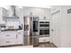 Bright and modern kitchen featuring stainless steel appliances and ample storage space at 2158 N 212Th Ave, Buckeye, AZ 85396