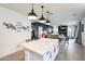 Bright and airy kitchen with large island perfect for cooking, dining, and entertaining at 2158 N 212Th Ave, Buckeye, AZ 85396
