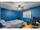 Cozy bedroom enhanced by a ceiling fan, offering a comfortable and inviting atmosphere at 21720 E Domingo Rd, Queen Creek, AZ 85142