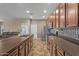 Spacious kitchen featuring an island, stainless steel appliances, and ample cabinet space at 21720 E Domingo Rd, Queen Creek, AZ 85142