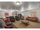 Spacious living room offers comfortable seating, a pool table, and a cozy atmosphere at 21720 E Domingo Rd, Queen Creek, AZ 85142