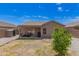 Expansive backyard featuring a patio and low-maintenance desert landscaping at 22544 W Mohave St, Buckeye, AZ 85326