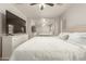 Cozy primary bedroom with mirrored closet and a view of the backyard at 22544 W Mohave St, Buckeye, AZ 85326