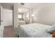Comfortable bedroom features a mirrored closet and natural light at 22544 W Mohave St, Buckeye, AZ 85326