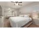 Cozy primary bedroom with mirrored closet and a view of the backyard at 22544 W Mohave St, Buckeye, AZ 85326