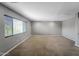 Bonus room featuring carpet flooring, neutral paint, and natural light at 2306 W Spur Dr, Phoenix, AZ 85085