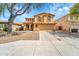 Charming two-story home featuring a well-maintained yard and inviting curb appeal at 2306 W Spur Dr, Phoenix, AZ 85085
