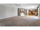 An open concept living area and kitchen with stairs to the second floor at 2306 W Spur Dr, Phoenix, AZ 85085