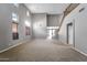 Expansive living area featuring high ceilings, a staircase, and natural light at 2306 W Spur Dr, Phoenix, AZ 85085