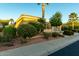 Stunning single-story home with manicured landscaping, rock accents, and lush green plants at 23213 N Del Monte Dr, Sun City West, AZ 85375