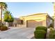 Beautiful single-story home featuring a spacious driveway and well-maintained landscaping at 23213 N Del Monte Dr, Sun City West, AZ 85375