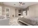 This main bedroom offers ample space, a fireplace, and convenient built-in storage at 23213 N Del Monte Dr, Sun City West, AZ 85375