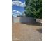 Low-maintenance gravel backyard with block wall for privacy at 235 N 61St Pl, Mesa, AZ 85205