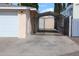 A spacious covered carport adjacent to the garage offers ample parking and protection at 235 N 61St Pl, Mesa, AZ 85205