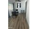 Bright dining area with natural light, modern fan, and seating for four at 235 N 61St Pl, Mesa, AZ 85205