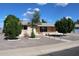 Charming single story home with mature trees and desert landscaping at 235 N 61St Pl, Mesa, AZ 85205
