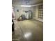 Spacious garage with water heater and room for storage at 235 N 61St Pl, Mesa, AZ 85205