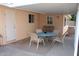 Cozy covered patio with neutral outdoor seating and a tranquil space for relaxing at 235 N 61St Pl, Mesa, AZ 85205