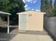 Exterior of a shed with security lights offering storage with easy access from the yard at 235 N 61St Pl, Mesa, AZ 85205