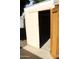 Open shed door revealing a dark interior, ready for storage or a workshop space at 235 N 61St Pl, Mesa, AZ 85205