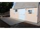 Exterior view of a functional shed with door and window and a air conditioner unit at 235 N 61St Pl, Mesa, AZ 85205