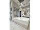 Modern bathroom with soaker tub, glass shower, and stylish double sink vanity at 24066 N 90Th Way, Scottsdale, AZ 85255