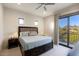 Spacious bedroom with balcony access, offering stunning views and natural light at 24066 N 90Th Way, Scottsdale, AZ 85255